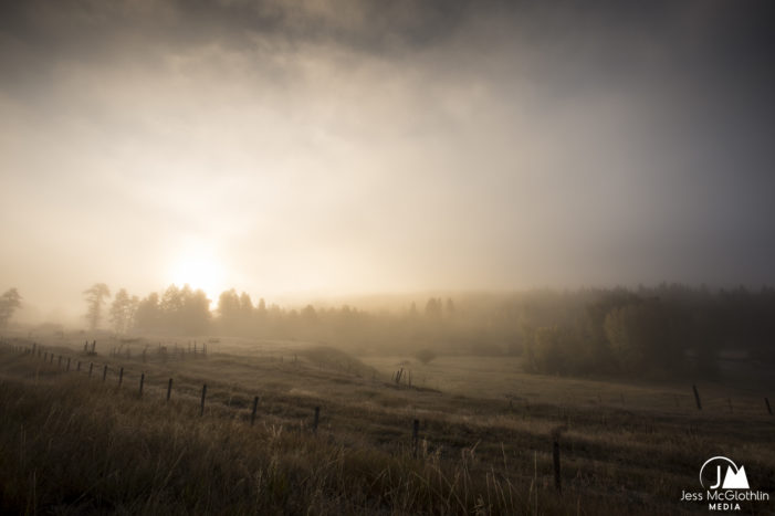 Jess McGlothlin Media. Foggy, misty fall sunrise along the Blackfoot River and farm / ranch in Montana.